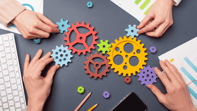 Business analyst and solution architect reviewing a BPMN process improvement model